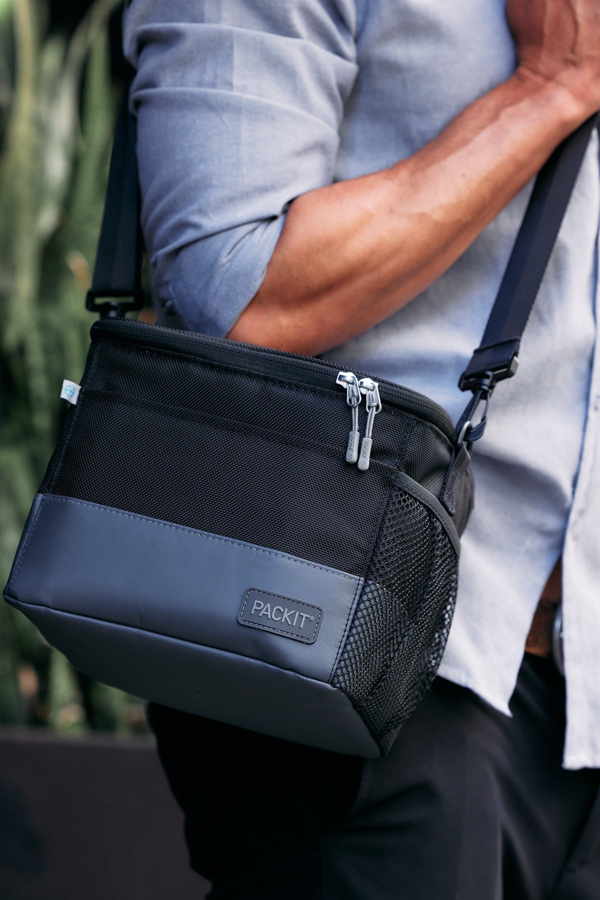 freezable-lunch-pail-a7 freezable-upright-lunch-pail-black-gray-lifestyle-male-city.jpg